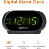 imageAmazon Basics Small Digital Oval Alarm Clock With LED Display Nightlight ampamp Battery Backup Black 45 x 35 x 24 InchesSmall