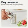 imageAmazon Basics Manual Can Opener Soft Grip Handle Dishwasher Safe Linen Gray