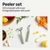 imageAmazon Basics Vegetable Peelers with Protective Covers 2Piece Set DishwasherSafe Linen Gray