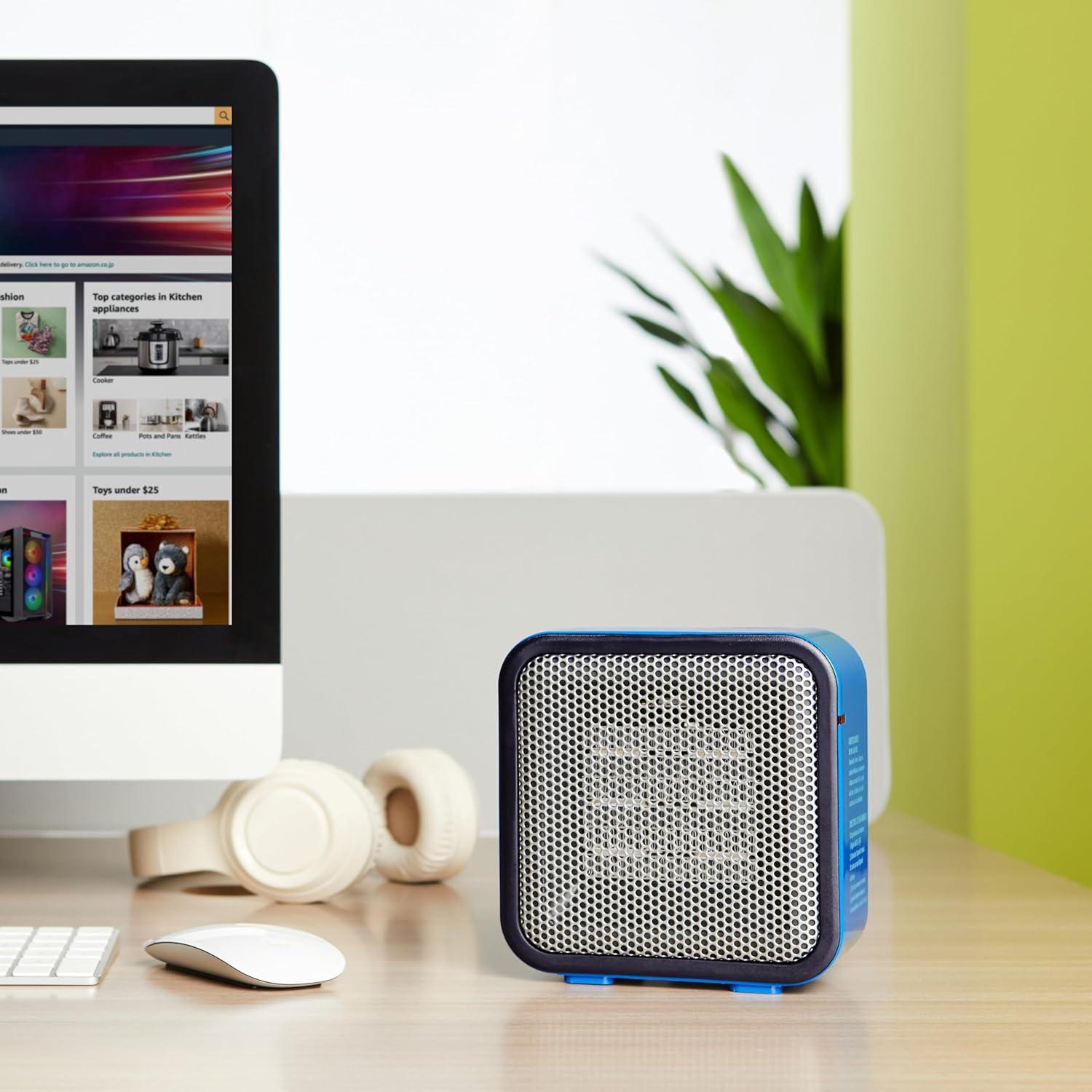 imageAmazon Basics Ceramic Space Heater Mini Heater for Office Desk Portable Tent Heater Indoor Use 500 W With TipOver Protection Lightweight 14 LBS Black 587D x 315W x 595HBlue